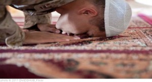 A person is prostrating during his Prayer.