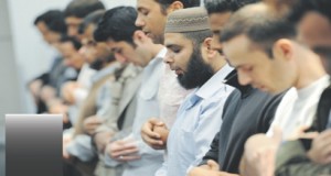 Muslim men are offering prayer.