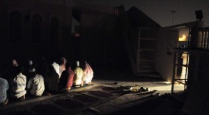 Some Muslims offer Fajr prayer in congregation.