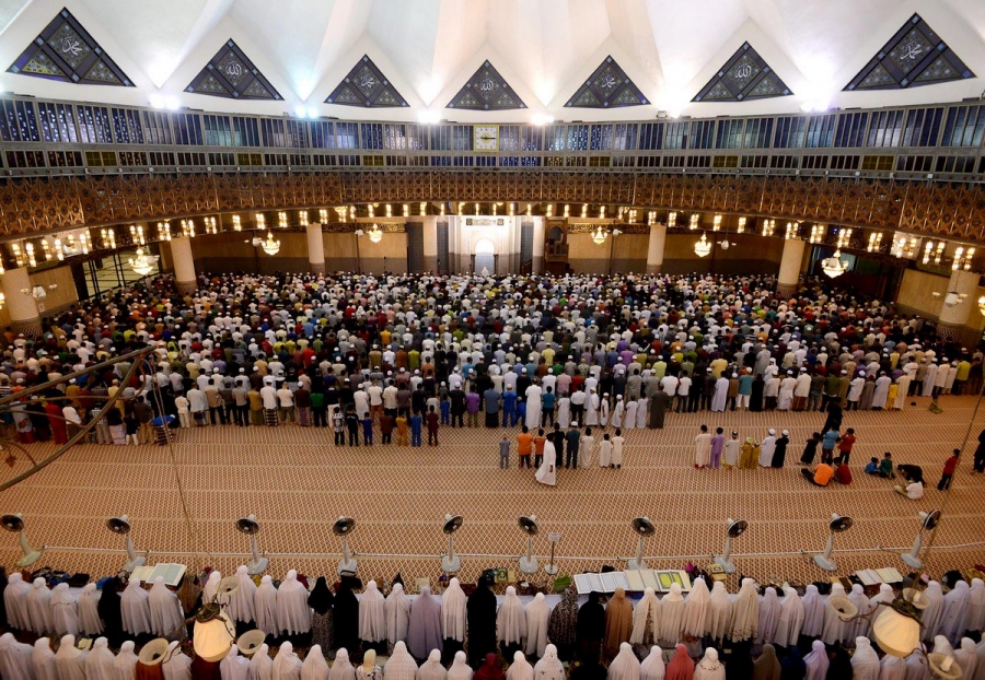 Muslims offer Tarawih prayer at mosque.