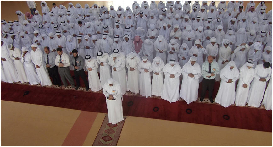 A group of Muslims offer prayer in congregation. Prayer Develops Unity