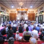 What is the ruling of delivering Friday Khutbah in a language other than Arabic? 