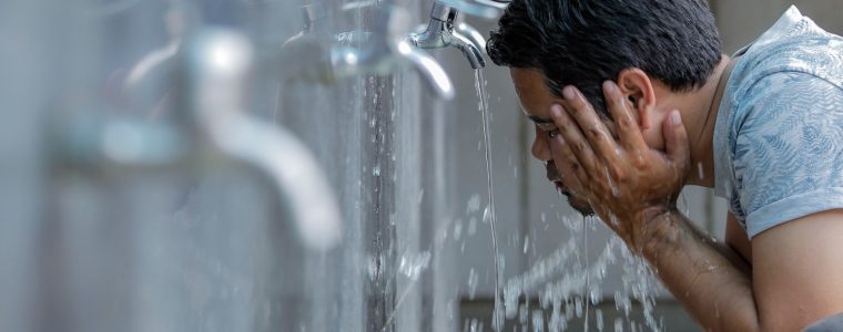 What Is the Ruling of Running Fingers through the Beard in Wudu?